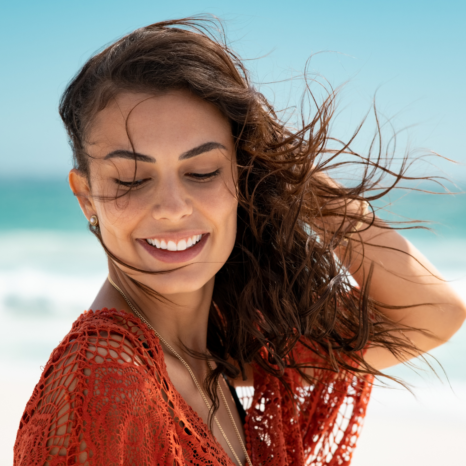 MOO Beach Girl tallow skincare product on the beach, made with grass-fed beef tallow to naturally nourish and hydrate skin, reflecting a sun-ready, clean, and natural aesthetic