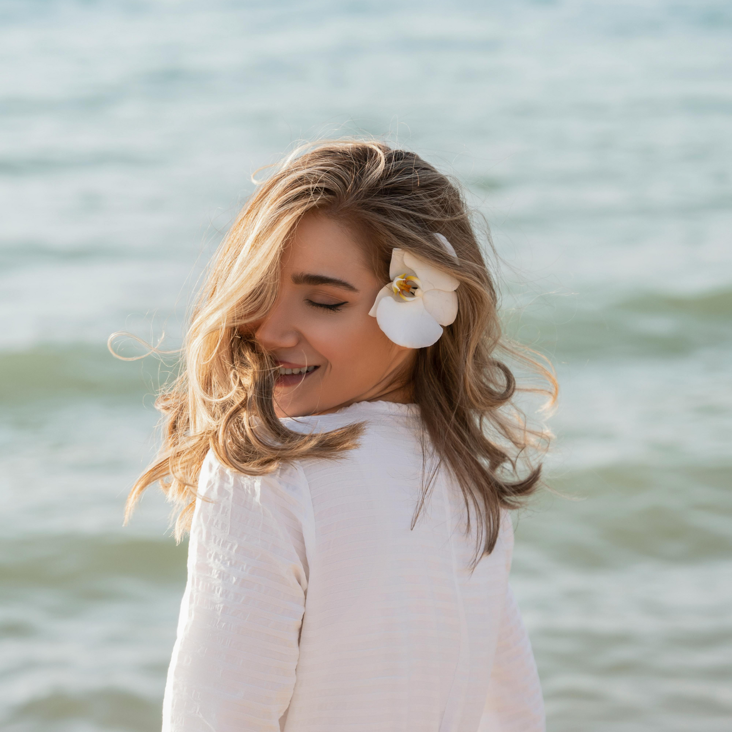 Sunshine Tallow MOO Fresh Face with flower, featuring a model with radiant, glowing skin, made with grass-fed beef tallow to naturally nourish, hydrate, and refresh the face, set against a bright, floral outdoor background